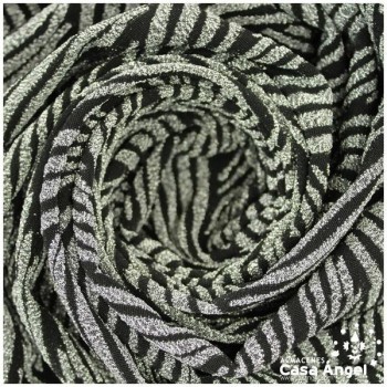 TELA DE PUNTO ELÁSTICO NEGRO CON PATRÓN DE LÚREX PLATA SERIE JET 150cm
