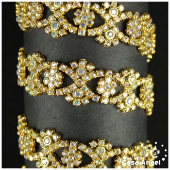 PASAMANERÍA METALIZADA ONDAS CRUZADAS CON STRASS 21mm