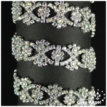 PASAMANERÍA METALIZADA ONDAS CRUZADAS CON STRASS 21mm