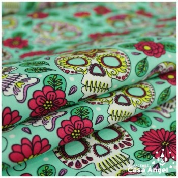 ALGODÓN ESTAMPADO CALAVERAS MEXICANAS SOBRE VERDE 150cm