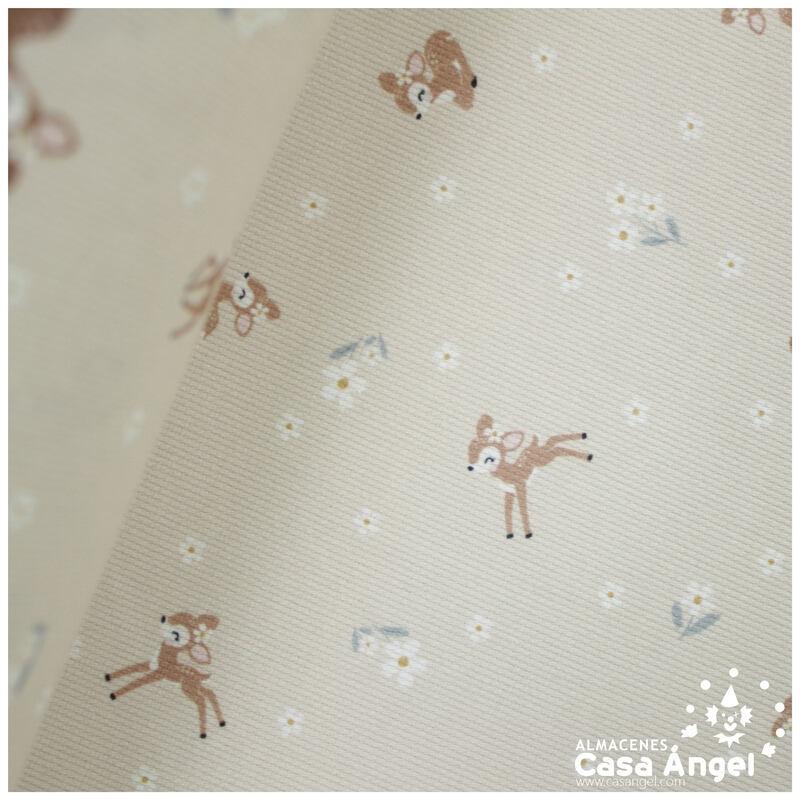 PIQUÉ DE ALGODÓN CON CERVATILLOS FONDO BEIGE 150cm