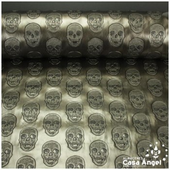 POLIPIEL COLOR LATÓN CON ESTAMPADO DE CALAVERAS EN RELIEVE 140cm
