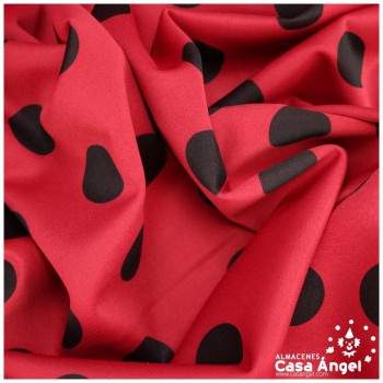 TELA NEOPRENO COLOR CON LUNARES NEGROS 150cm