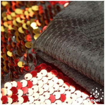 TELA DE RASO CON LENTEJUELAS REVERSIBLES ROJO Y ORO SERIE RAMÓN 135cm
