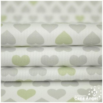 TELA PIQUÉ CANUTILLO CON CORAZONES GRISES 150cm