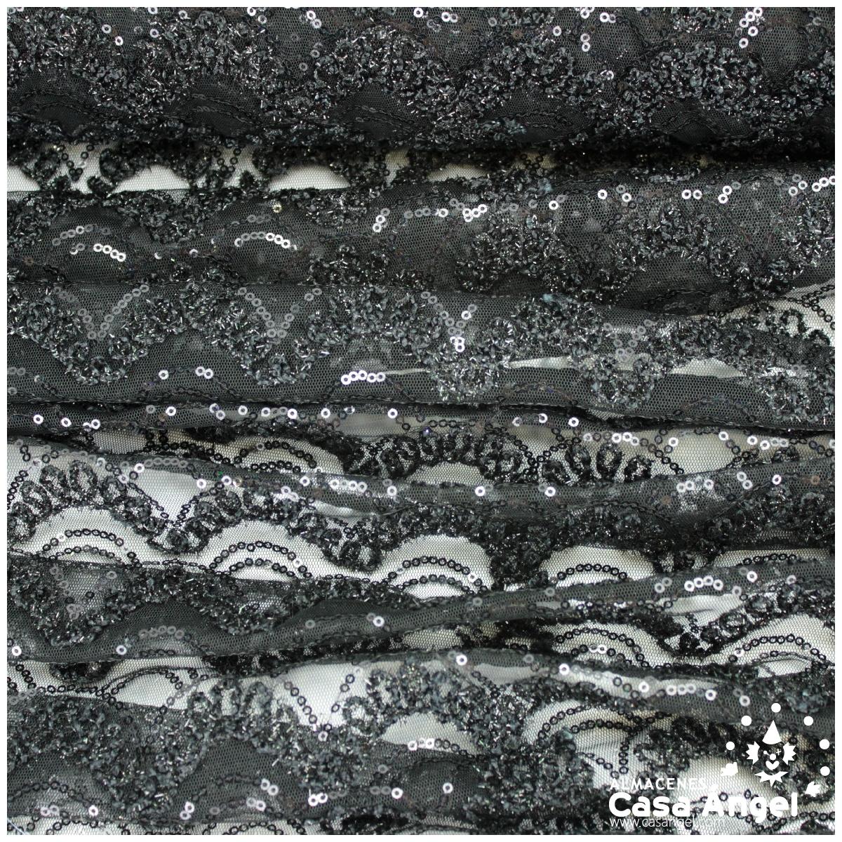 Tejido de tul negro bordado con cintas y abalorios tipo cristal